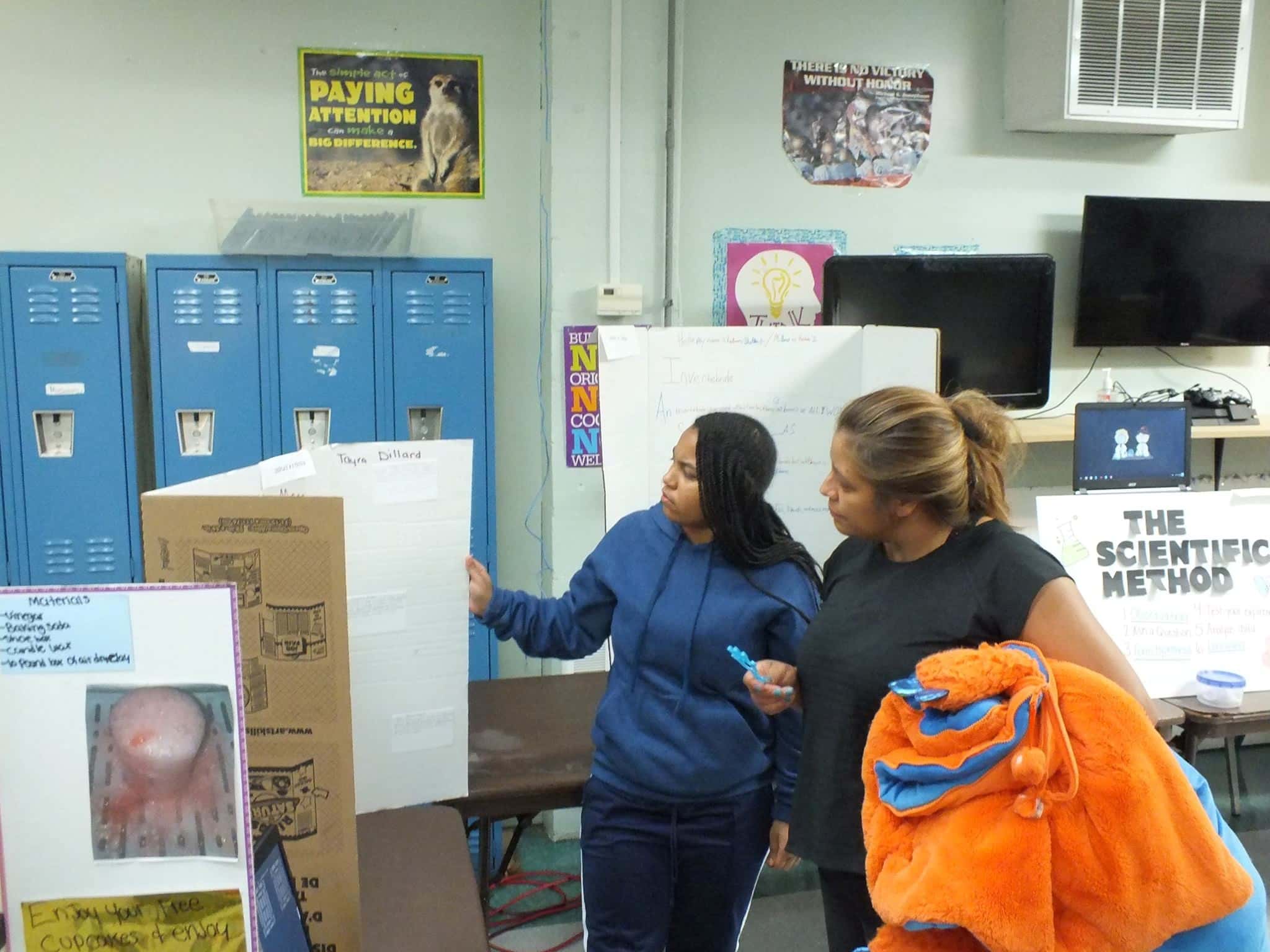 Student showing a visitor around Rhema Preparatory Academy
