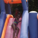 Slip and slide at summer camp.