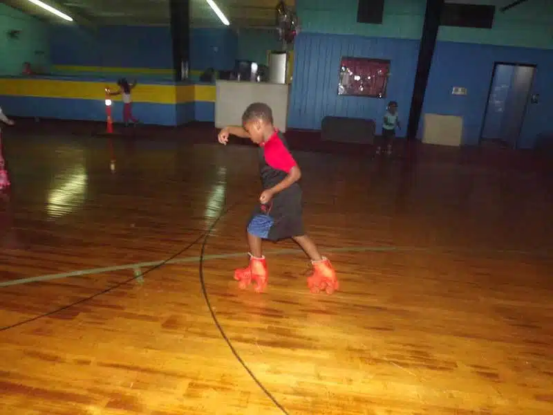 Showing off some moves at the roller rink.