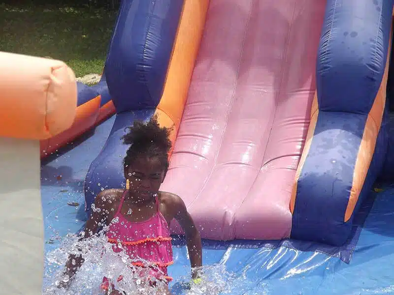 Slip and slide at summer camp.